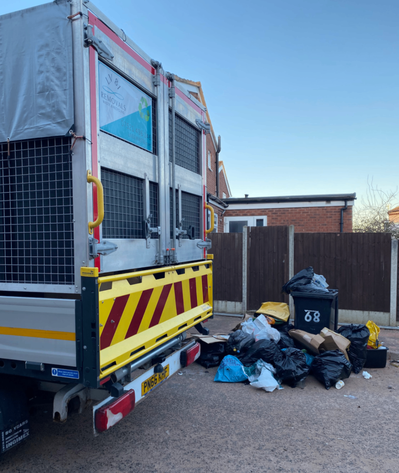 Driveway rubbish clearance with bagged waste ready for collection