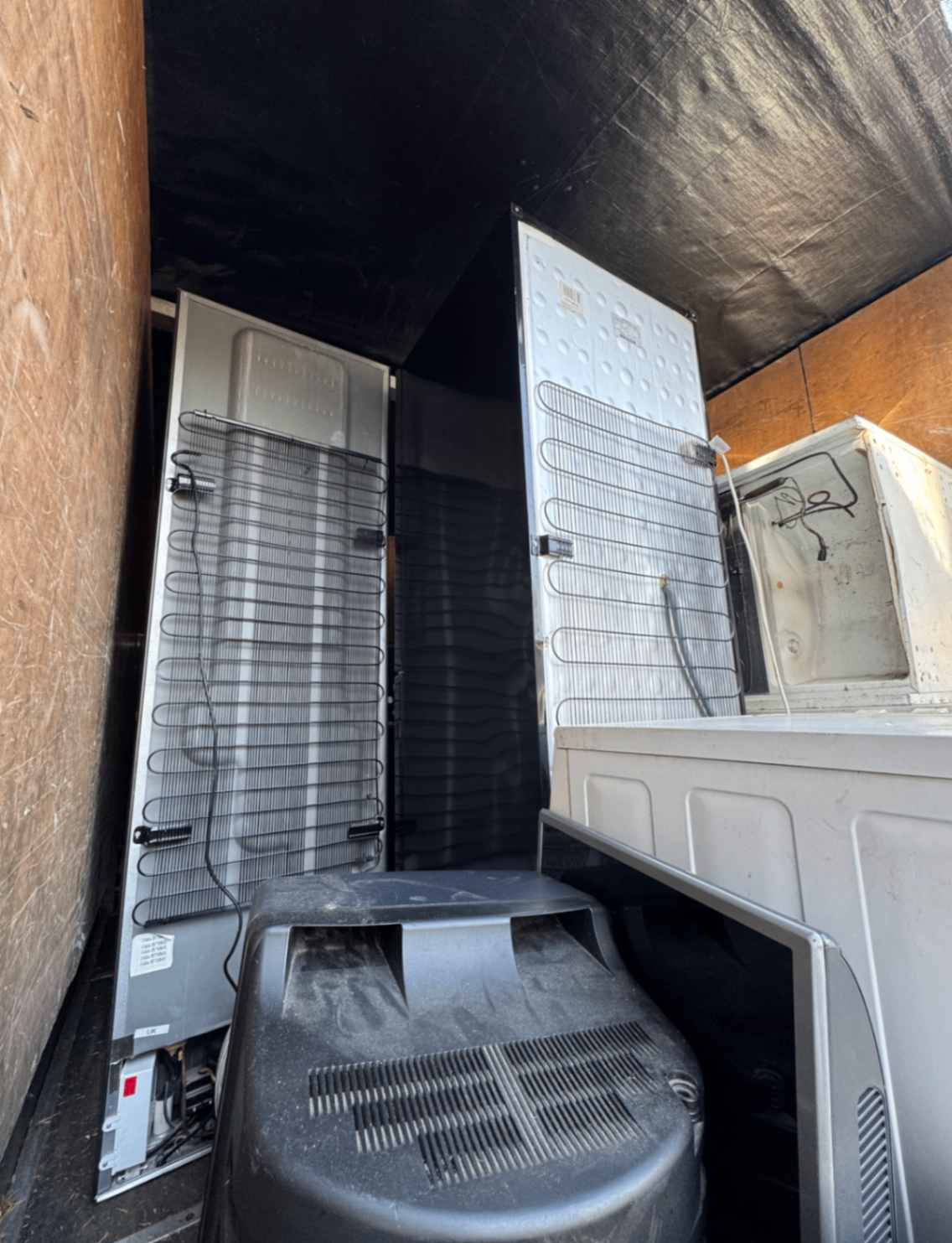 Fridges and bulky appliances safely loaded for removal
