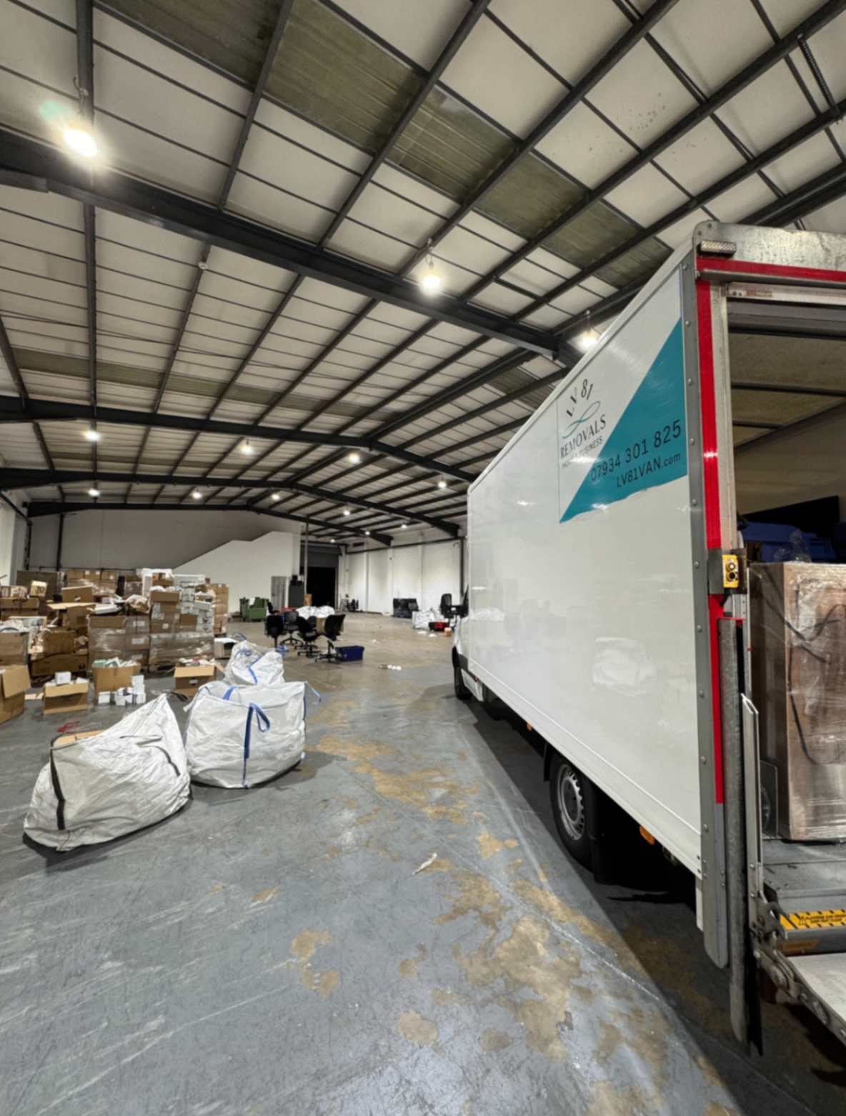 LV81 Removals truck handling a commercial warehouse clearance